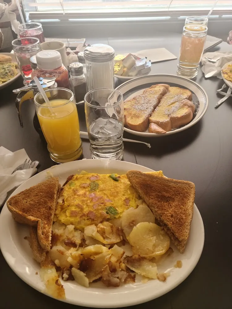 Chicken Fried Steak with Sausage Gravy Eggs Homefries & Toast